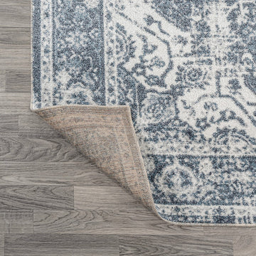 Keesha Bold Distressed Medallion Low-Pile Machine-Washable Area Rug